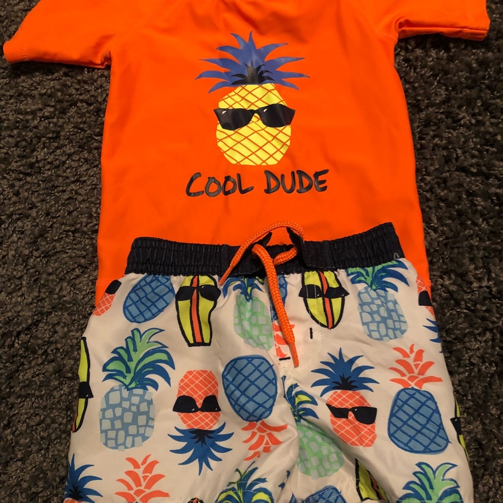 Swim trunks and rashguard